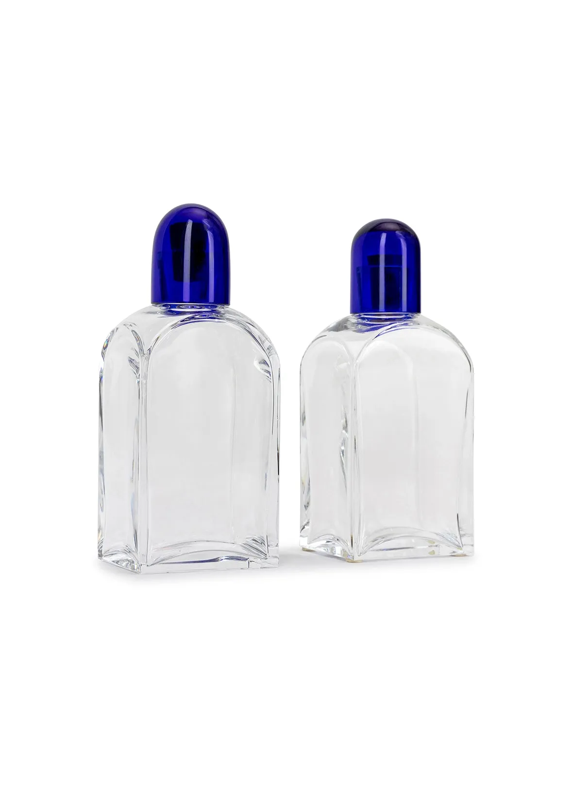 pair of baccarat crystal decanters with blue caps